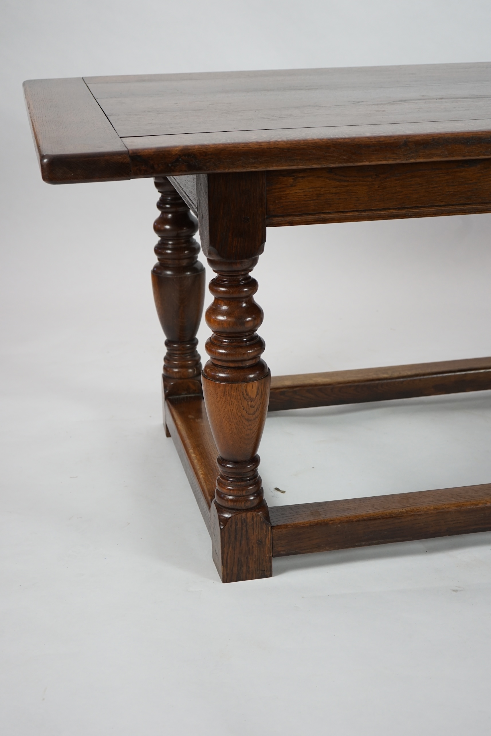 A 17th century style oak refectory table